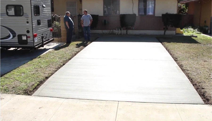 Best KC Concrete team completing a concrete driveway project in Kansas City